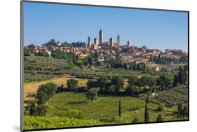 San Gimignano, Siena Province, Tuscany, Italy. Fields surrounding the medieval town famous for i...-null-Mounted Photographic Print