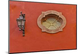 San Miguel De Allende, Mexico. Lantern and shadow on colorful buildings-Darrell Gulin-Mounted Photographic Print