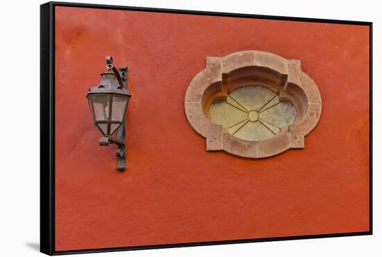 San Miguel De Allende, Mexico. Lantern and shadow on colorful buildings-Darrell Gulin-Framed Stretched Canvas