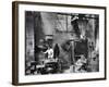 Sand Being Sifted by Worker Into Molds in Factory-Emil Otto Hoppé-Framed Photographic Print