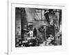 Sand Being Sifted by Worker Into Molds in Factory-Emil Otto Hoppé-Framed Photographic Print