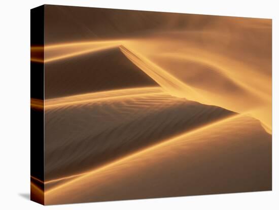 Sand Blowing on Crest of Dune in Erg Chebbi, Sahara Desert, Near Merzouga, Morocco-Lee Frost-Stretched Canvas