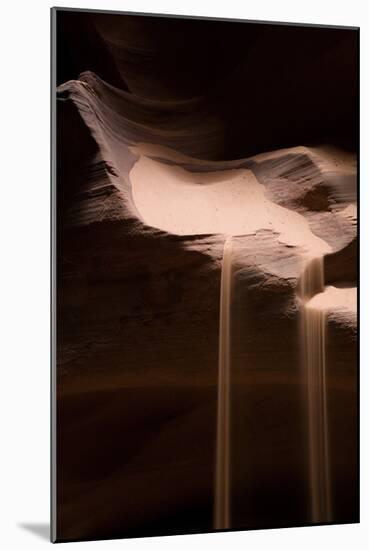 Sand falling from rocks, in narrow sandstone slot canyon, Antelope Canyon, Navajo Nation-Bob Gibbons-Mounted Photographic Print