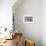 Sandwich Harbor, Namibia. Gull flies over immense sand dunes.-Janet Muir-Framed Photographic Print displayed on a wall