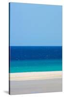 Sandy beach and bright blue ocean, Fuerteventura-Edwin Giesbers-Stretched Canvas