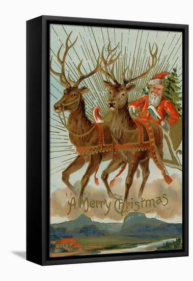 Santa and His Reindeer Flying Through the Sky with a Sleigh Full of Christmas Goodies-null-Framed Stretched Canvas