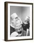 Santa Claus and 5 Year Old Demonstrating Right Way to Hold Child-Martha Holmes-Framed Photographic Print