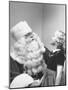 Santa Claus and 5 Year Old Demonstrating Right Way to Hold Child-Martha Holmes-Mounted Photographic Print