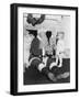 Santa Claus with a Little Boy and a Teddy Bear in Front of a Fire Place-null-Framed Photo