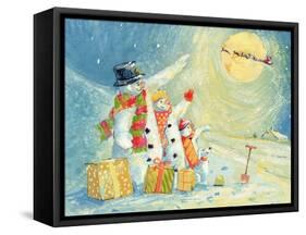 Santa Delivering Presents to the Snow Family-David Cooke-Framed Stretched Canvas