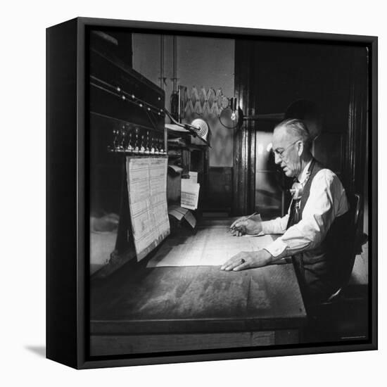 Santa Fe Railroad Dispatcher Working on a Freight Train-Bernard Hoffman-Framed Stretched Canvas