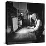 Santa Fe Railroad Dispatcher Working on a Freight Train-Bernard Hoffman-Stretched Canvas