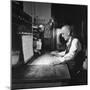 Santa Fe Railroad Dispatcher Working on a Freight Train-Bernard Hoffman-Mounted Photographic Print