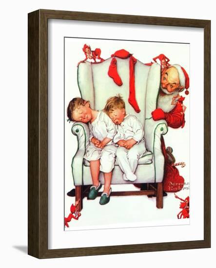 Santa Looking at Two Sleeping Children (or Santa Filling the Stockings)-Norman Rockwell-Framed Giclee Print