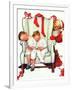 Santa Looking at Two Sleeping Children (or Santa Filling the Stockings)-Norman Rockwell-Framed Giclee Print