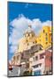 Santa Maria delle Grazie church among colourful houses in the fishing village of Marina Corricella-Paolo Graziosi-Mounted Photographic Print