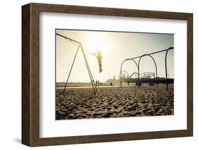 Santa Monica Beach. Silhouette of a Woman Going up with the Swing. Concept about Traveling,United S-Oneinchpunch-Framed Photographic Print