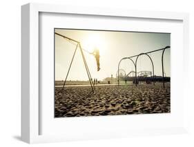 Santa Monica Beach. Silhouette of a Woman Going up with the Swing. Concept about Traveling,United S-Oneinchpunch-Framed Photographic Print