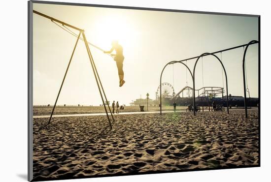 Santa Monica Beach. Silhouette of a Woman Going up with the Swing. Concept about Traveling,United S-Oneinchpunch-Mounted Photographic Print