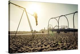 Santa Monica Beach. Silhouette of a Woman Going up with the Swing. Concept about Traveling,United S-Oneinchpunch-Stretched Canvas