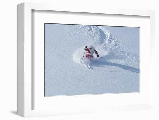 Santa Skiing at Snowbird Ski Resort, Wasatch Mountains, Utah.-James Kay-Framed Photographic Print