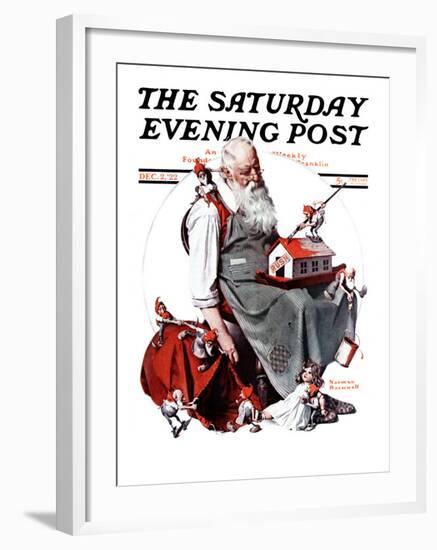 "Santa with Elves" Saturday Evening Post Cover, December 2,1922-Norman Rockwell-Framed Giclee Print