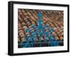 Santiago de Cuba, red tile roof and blue wrought iron cross.-Merrill Images-Framed Photographic Print