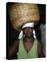 Sao Tomense Woman Carries Basket Full of Cocoa Beans, Cocoa Processing Plant in Agua Ize, Sao Tome-Camilla Watson-Stretched Canvas