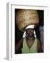 Sao Tomense Woman Carries Basket Full of Cocoa Beans, Cocoa Processing Plant in Agua Ize, Sao Tome-Camilla Watson-Framed Photographic Print