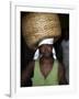 Sao Tomense Woman Carries Basket Full of Cocoa Beans, Cocoa Processing Plant in Agua Ize, Sao Tome-Camilla Watson-Framed Photographic Print