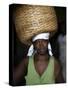 Sao Tomense Woman Carries Basket Full of Cocoa Beans, Cocoa Processing Plant in Agua Ize, Sao Tome-Camilla Watson-Stretched Canvas