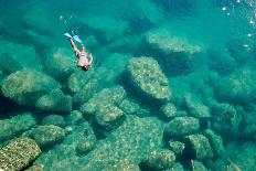 A Snorkeler Explores the Scenic Rock Formations of the Islands of Lake Malawi, Malawi, Africa.-SAPhotog-Framed Photographic Print