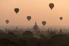 Bagan, balloons flying over ancient temples-Sarawut Intarob-Stretched Canvas