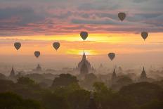 Bagan, balloons flying over ancient temples-Sarawut Intarob-Stretched Canvas