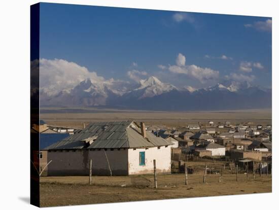 Sary Tash with Mountains in the Background, Kyrgyzstan, Central Asia-Michael Runkel-Stretched Canvas