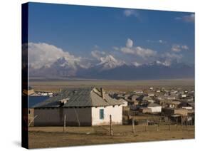 Sary Tash with Mountains in the Background, Kyrgyzstan, Central Asia-Michael Runkel-Stretched Canvas