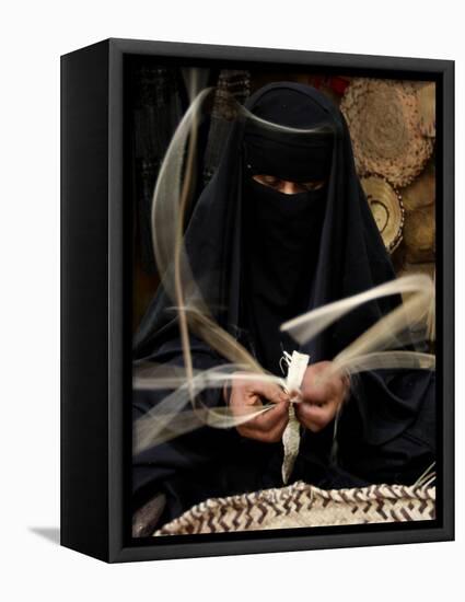 Saudi Woman Works to Demonstrate Her Craft as She Makes a Cane Box at a Fair in Riyadh-null-Framed Stretched Canvas