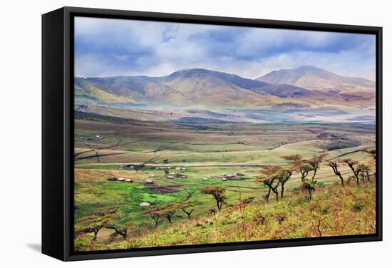 Savannah Landscape in Tanzania, Africa. Maasai Houses in the Valley-Michal Bednarek-Framed Stretched Canvas