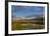 Sawtell Peak reflects in wetlands with herd of pronghorn antelope look on in the Red Rocks National-Chuck Haney-Framed Photographic Print