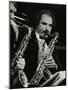 Saxophonist Frank Tiberi Performing at the Forum Theatre, Hatfield, Hertfordshire, 1983-Denis Williams-Mounted Photographic Print