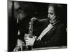 Saxophonist Frank Tiberi Performing at the Forum Theatre, Hatfield, Hertfordshire, 1983-Denis Williams-Mounted Photographic Print