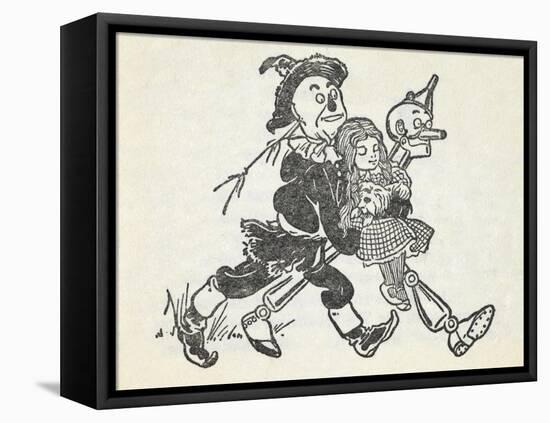 Scarecrow and the Tin Woodman Carrying a Sleeping Dorothy and Toto Out Of the Deadly Poppy Field-William Denslow-Framed Stretched Canvas