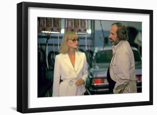 SCARFACE, 1983 directed by BRIAN by PALMA On the set, Michelle Pfeiffer with the director, Brian by-null-Framed Photo