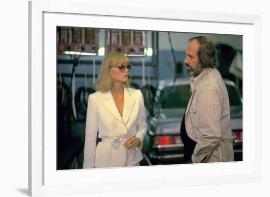 SCARFACE, 1983 directed by BRIAN by PALMA On the set, Michelle Pfeiffer with the director, Brian by-null-Framed Photo