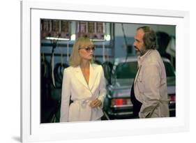 SCARFACE, 1983 directed by BRIAN by PALMA On the set, Michelle Pfeiffer with the director, Brian by-null-Framed Photo