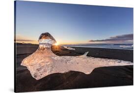 Scattered Ice from Icebergs on Black Sand Beach at Joklusarlon, Iceland-Chuck Haney-Stretched Canvas