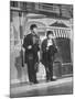 Scene from Film "Easter Parade," with Fred Astair and Judy Garland, Both Dressed as Hoboes-Allan Grant-Mounted Premium Photographic Print