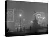 Scene from the Streets of London, as Afternoon Fog Turns Day Into Night-Carl Mydans-Stretched Canvas