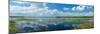 Scenic view of a lake against cloudy sky, Upper Myakka Lake, Myakka River State Park, Sarasota,...-null-Mounted Photographic Print