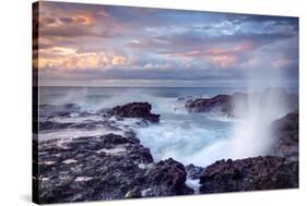 Scenic View of Blowhole on Rocky Coastline with Sunset Cloudscape Background, Reunion Island.-infografick-Stretched Canvas